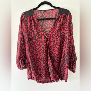 Maurice sheer flowy red and black print shirt. Medium
